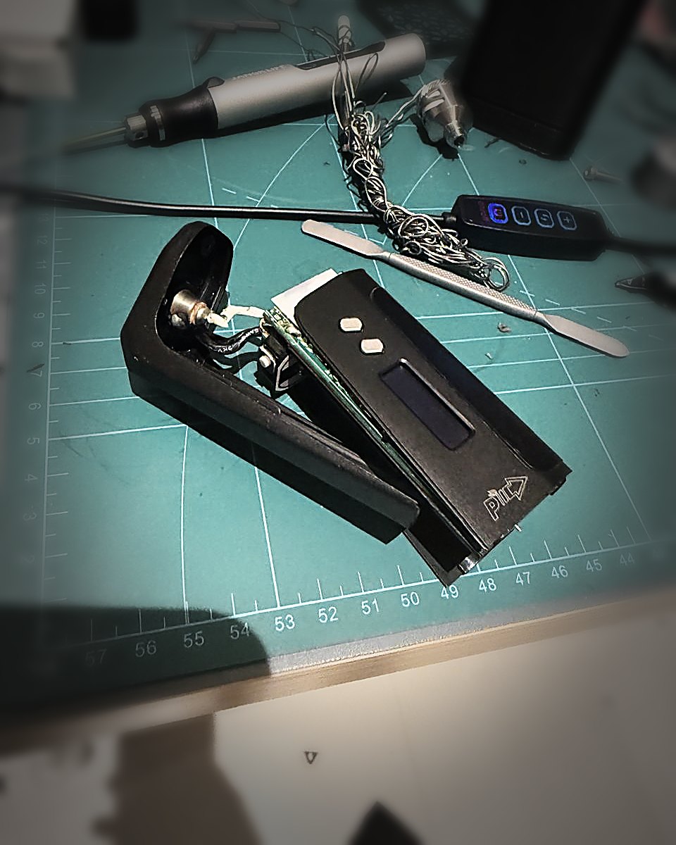 An off-the-shelf electric burner opened on the bench for study